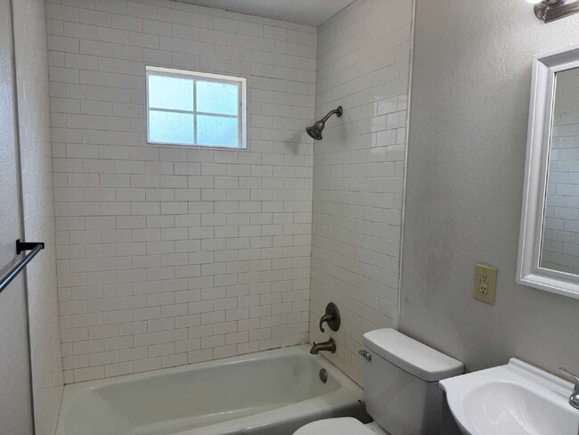Building Photo - Updated 3 bedroom one bath home with a shade tree and large yard.