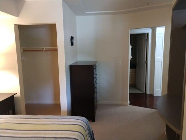 Building Photo - SAVE MONEY ON EXTENDED STAYS.  Beautiful Furnished and Completly Supplied Condo in Downtown Misso...