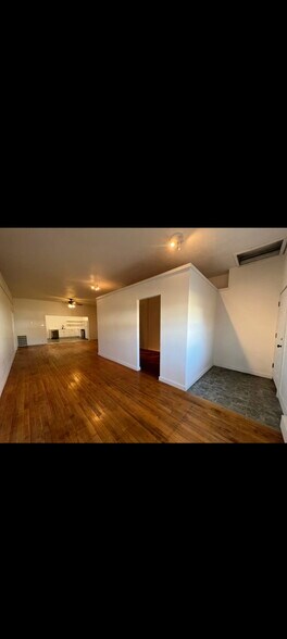 Open concept living area - 132 E Main St