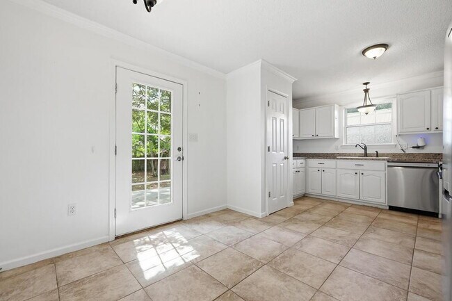 Building Photo - New rental move in ready! 4 bedrooms | 2 bathooms