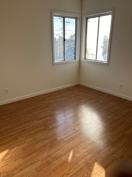 Bedroom 1 is freshly painted. - 225 E Fremont Sq