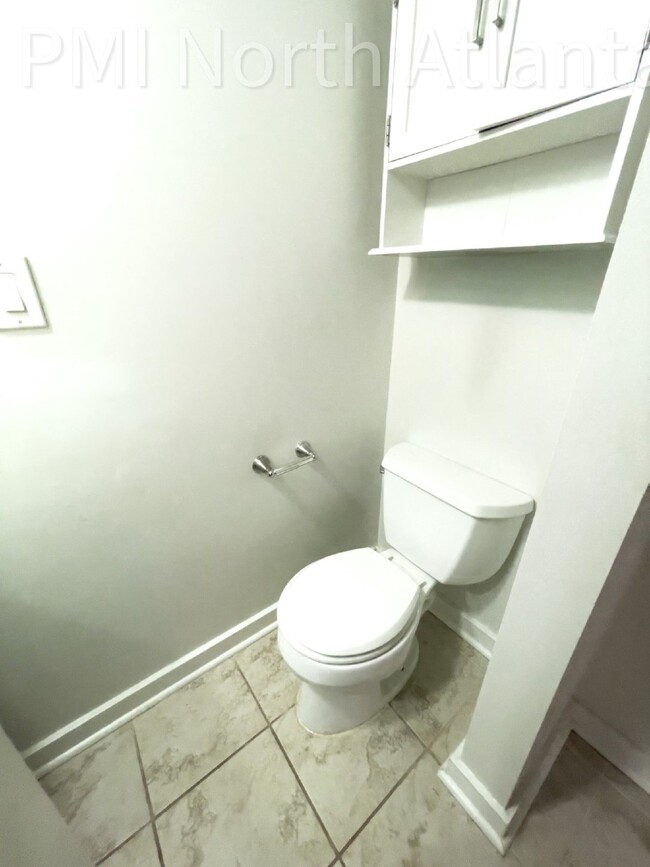 Building Photo - Pet Friendly End Unit!