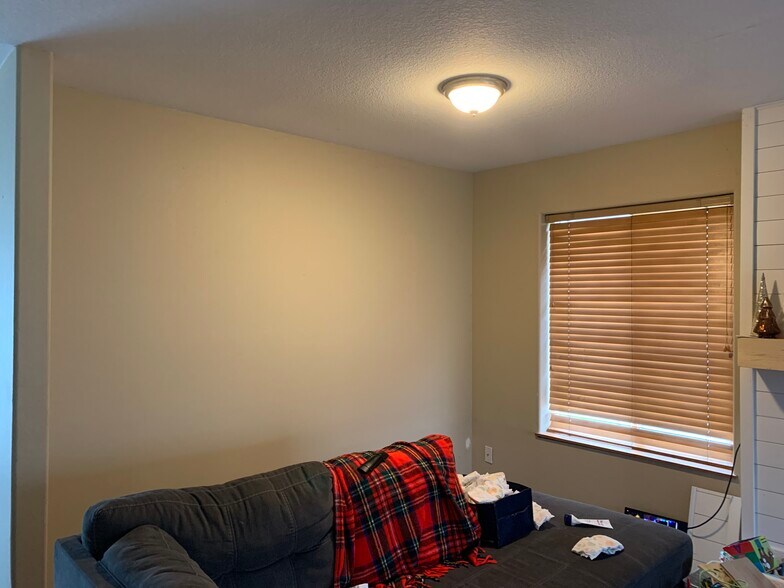 Living Room wall between living Room and Kitchen - 206 E Illinois St