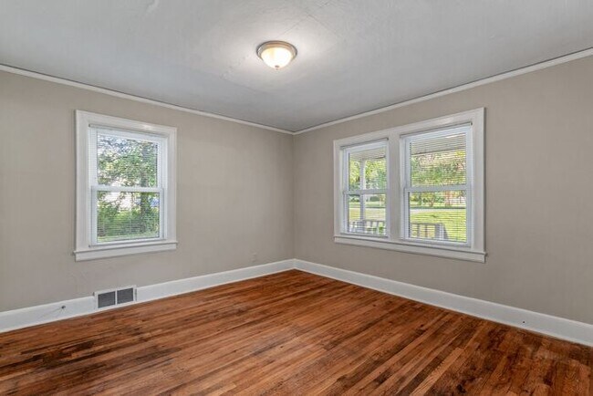 Building Photo - Adorable Home, Just Painted, Wood Flooring...