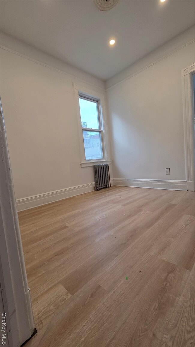 Building Photo - 42-21 65th Pl