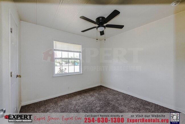 Building Photo - A cozy 3-bedroom, 2-bathroom home nestled on a corner lot