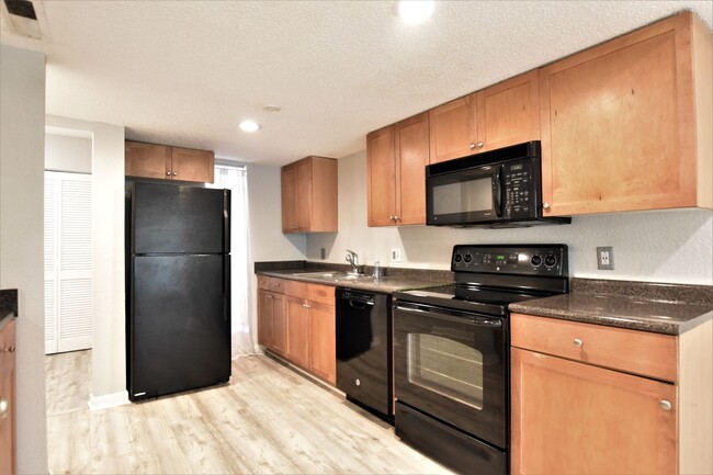 Building Photo - **Spacious 3-Bedroom Condo Available! 50% ...