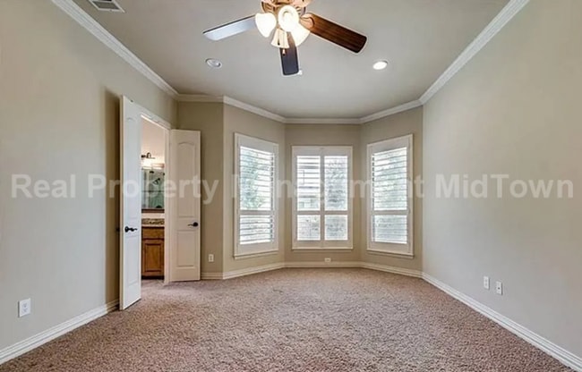 Building Photo - Well-Planned 4BR/3BA—Space for Guests, Off...