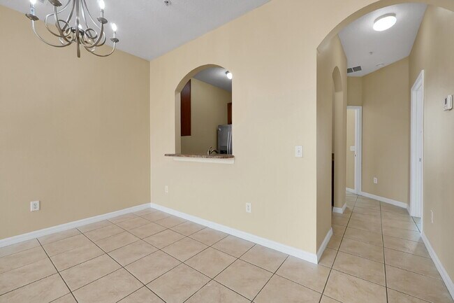 Building Photo - "Charming 3-Bed, 2-Bath Condo Oasis in Orlando – 1,000 Sq Ft of Comfort!"