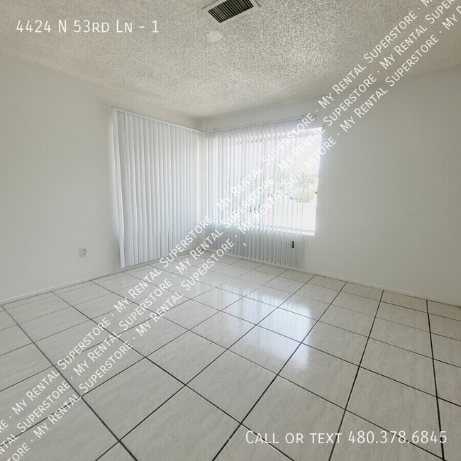 Building Photo - 4424 N 53rd Ln