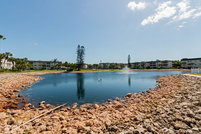 Building Photo - Ground Floor End Unit 2-Bed Condo with Lake Views | AVAIL NOW