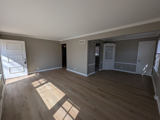 Building Photo - Fully Renovated Home with Sunroom, Garage & Huge Fenced Yard