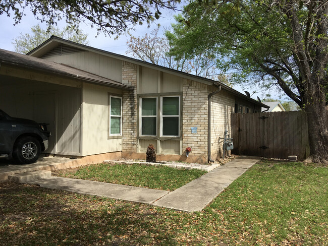 Front view with walkway from covered parking - 12811 Broughton Way