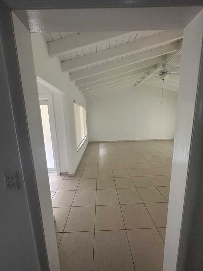 View of Living Room from bedroom hallway - 5400 Orduna Dr