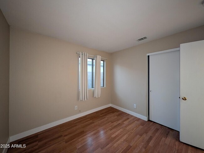 Building Photo - 7059 W Gardenia Ave