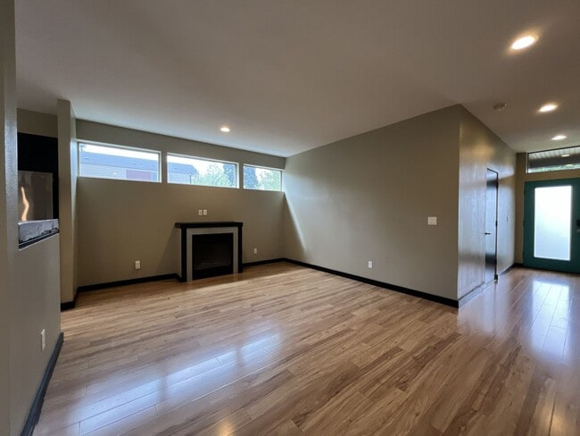 Building Photo - Charming 3 Bedroom, 2.5 Bathroom Home with Large Living Room, Tall Windows, Island Kitchen, and A...