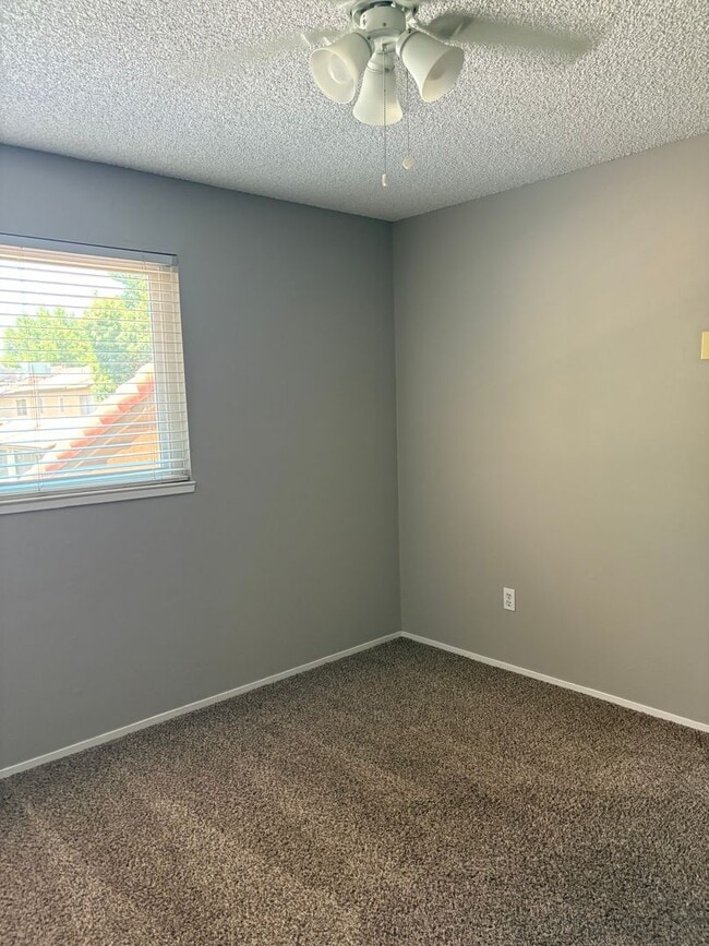 Building Photo - Updated Two Bedroom, 1.5 Bath Condo w/Fire...