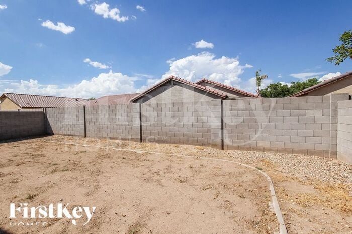 Building Photo - 15552 W Port Au Prince Ln
