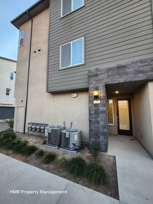 Primary Photo - Spacious 3-Story Condo with 4 Bedrooms & 4...