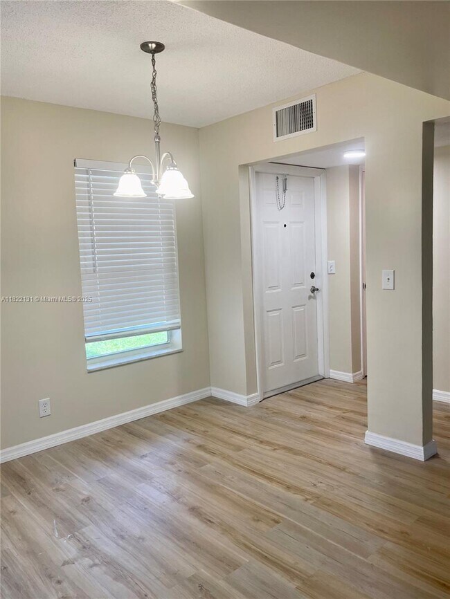Building Photo - 10290 N Military Trl