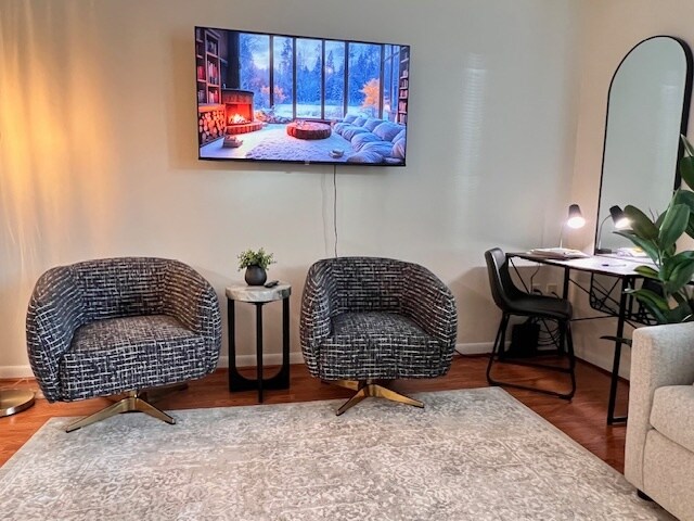 A true living area with comfortable seating. 55-inch 4K TV and dedicated workspaceI - 350 G St SW