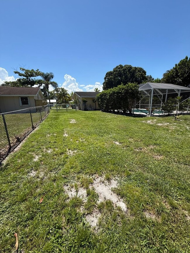 Building Photo - 3/2/1 POOL Home with Fenced Yard--Pool & Y...