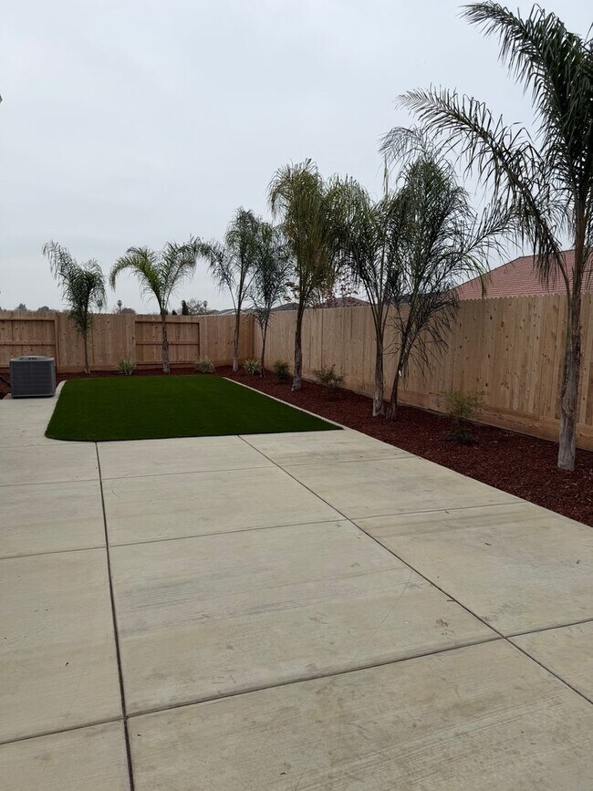 Building Photo - Spacious Brand New 4-Bedroom, 3-Bathroom Home with Solar & Low-Maintenance Yard