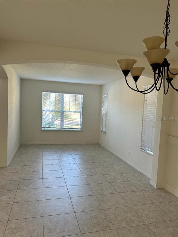 Building Photo - 8818 Tropical Palm Dr