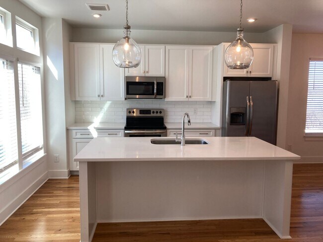 Building Photo - 3 bedroom, 3.5 bath, Spacious & Open Floor...