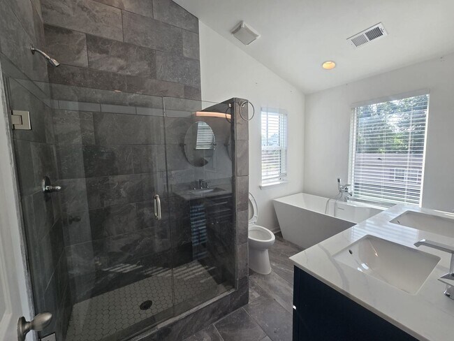 Building Photo - Welcome to The Buchanan Retreat – Modern 4...