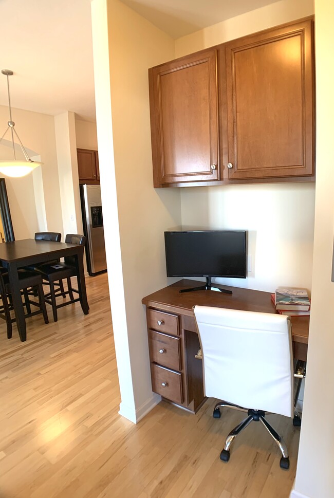 Built-in home office center with desk, drawers and cabinets. - 500 E Grant St