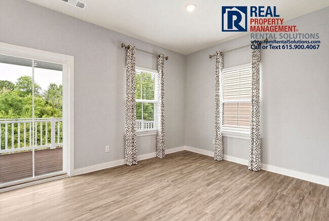 Building Photo - Great 4 bd 2.5 ba with attached garage and large deck!