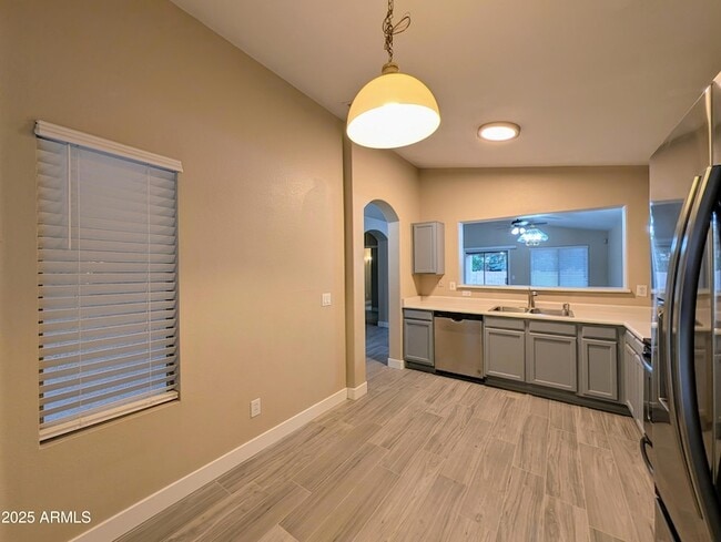 Building Photo - 7059 W Gardenia Ave