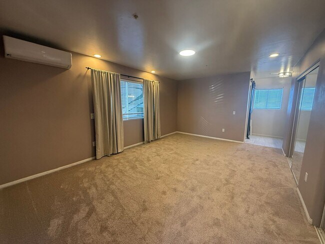 Building Photo - 4BR/2BA HOME w/ attached garage, usable land, fenced in back yard in CAMPO available!