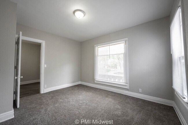 Building Photo - "Charming 3-Bedroom Duplex Haven on W 29th St – Spacious 1031 Sq Ft Gem in Indianapolis!"