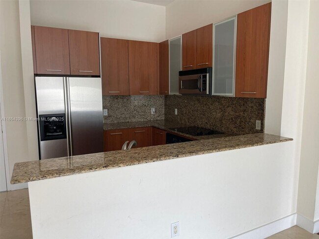 Building Photo - 9055 SW 73rd Ct