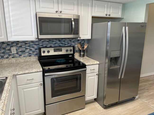 Building Photo - Charming Remodeled 2-Bed, 1-Bath Condo at ...