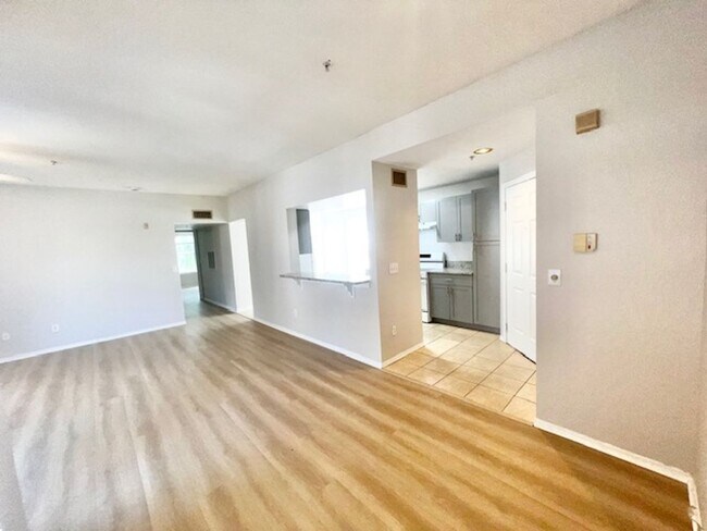 Building Photo - NEW-Remodeled bathroom & kitchen! NEW VINYL PLANK flooring & fresh paint! 2 bedroom 1 bath condo ...
