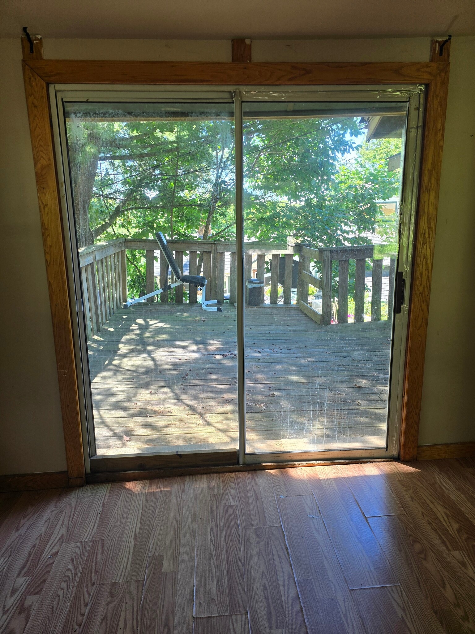 Doors to enter the deck on the side of the house - 33 Maple Trl