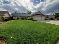 Building Photo - Beautiful Home with 3-Car Garage and Lands...