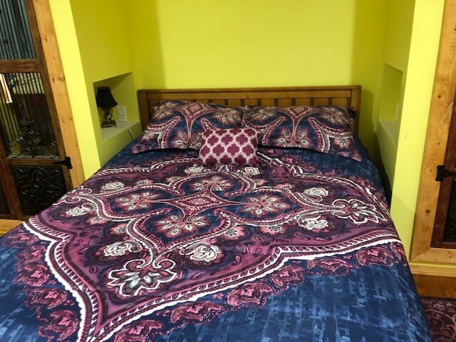 Queen size bed - 608 Kerlerec St