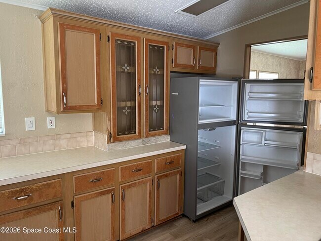Building Photo - 2395 Coconut Palm Dr