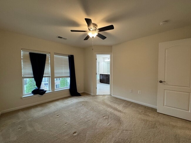 Building Photo - Stylish 3 Bed 3 Bath Townhome With Patio A...