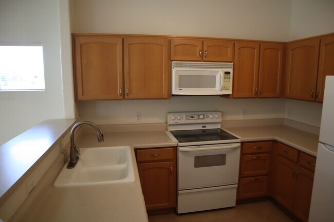 Building Photo - The art of living well in a thriving 55+ community