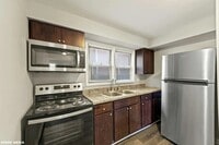 Building Photo - 7617 S Colfax Ave