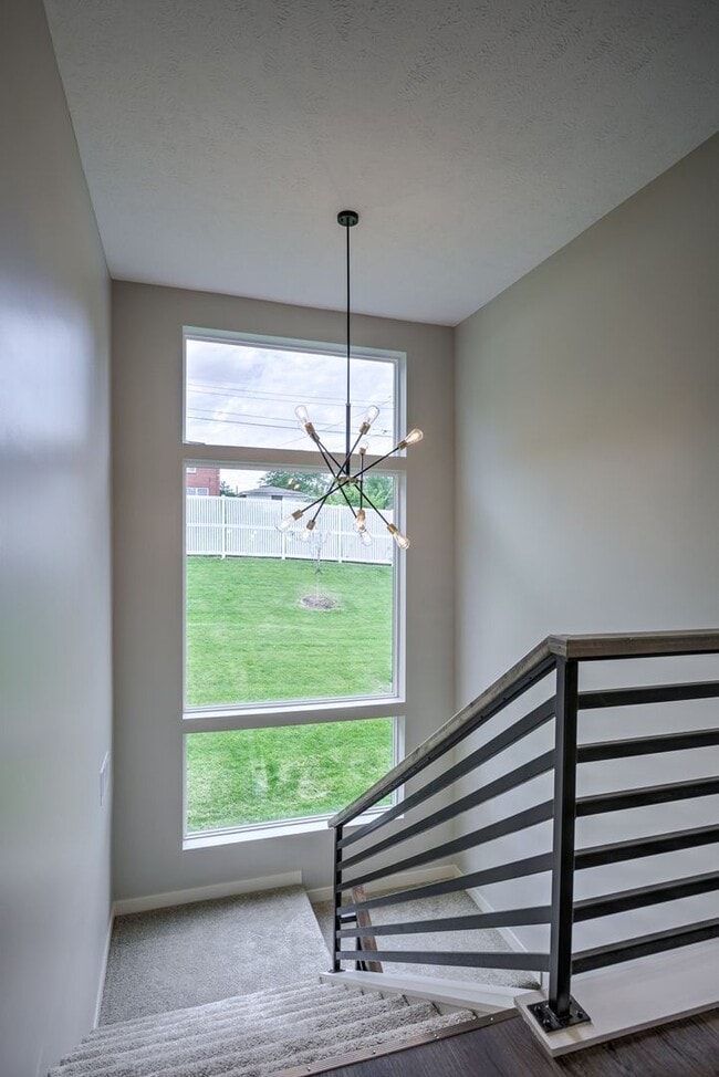 Building Photo - Modern 3BR Retreat | Penthouse + Skyline Views - Fully Furnished Option