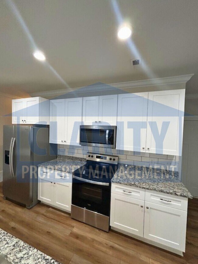 Building Photo - **One month free w/ a 15 month lease!**