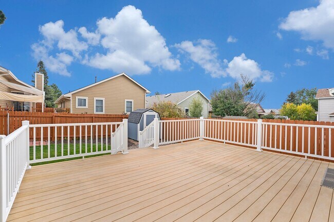 Building Photo - Spacious 4-Bedroom Home in District 20 with Huge Deck & Fenced Yard