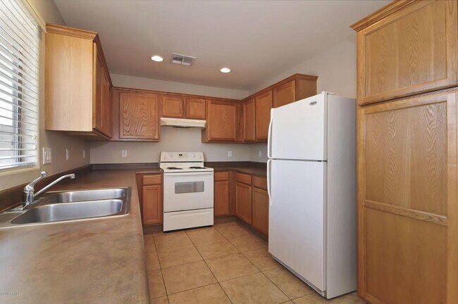 Building Photo - Great-room floor plan with 4 bedrooms PLUS den