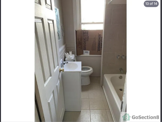 Building Photo - Spacious 3BR Townhouse with Modern Kitchen  Hardwood Floors  Available Now!